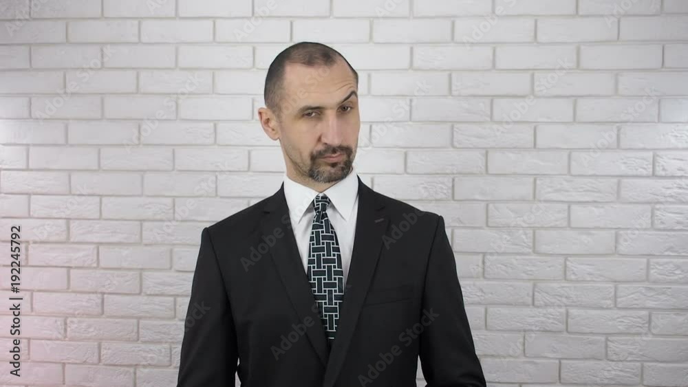 The boss takes the money. A businessman is taken away money. The boss takes the money. A businessman is taken away money.