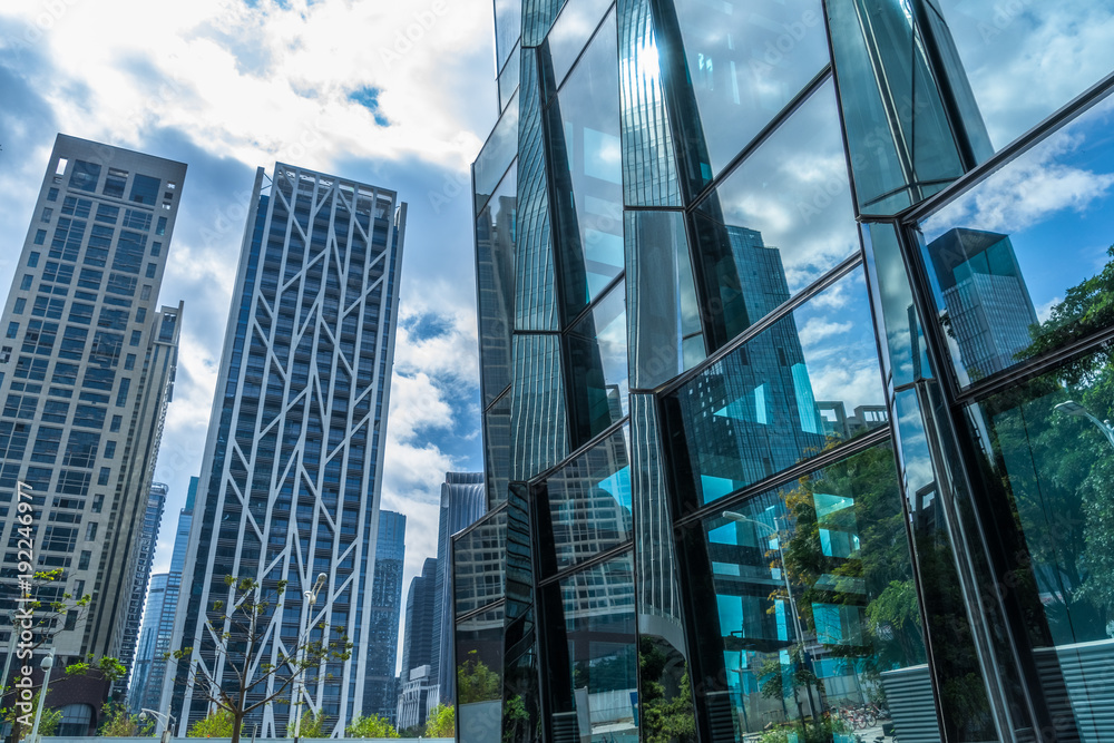 Fototapeta premium Modern office building against blue sky.
