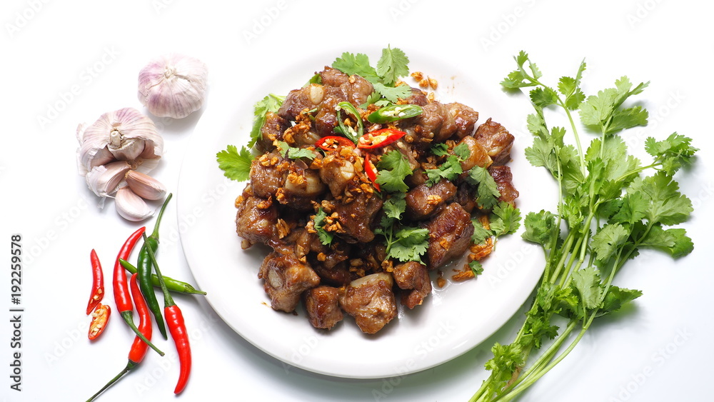 Thai traditional fried pork spare ribs with garlic and pepper