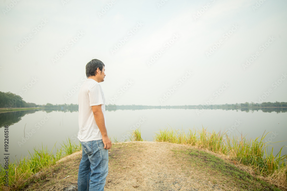 man at the blue lake man at the blue lake