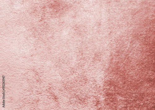 Rose gold pink velvet background or velour flannel texture made of cotton or wool with soft fluffy velvety fabric cloth metallic color material    photo