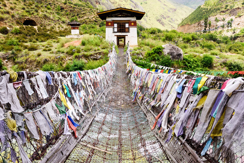 Old Iron Chain Bridge of Tachog Lhakhang Monastery, Paro River, Bhutan photo