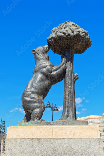 Sculpture of Bear and the Madrono tree in the square Puerta Del