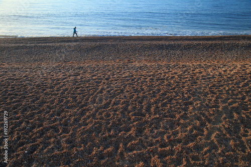 Early morning on a pebble beach in town of Seaton on the Jurassic Coast
