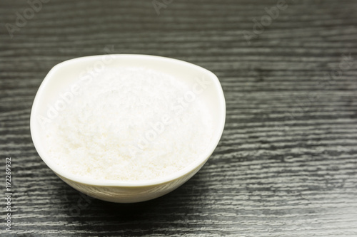 Bowl with coconut shavings. photo