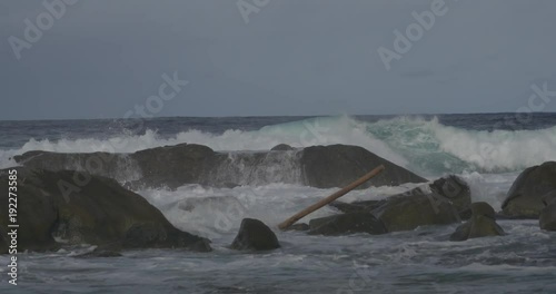 Aruba crashing waves on rocks before a hurricane
