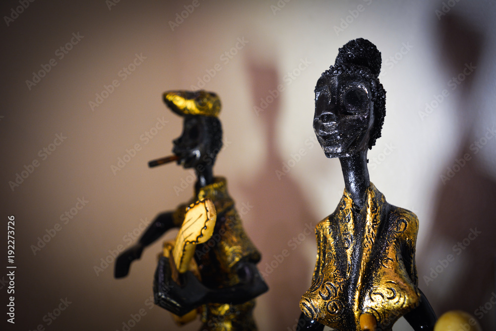 statuettes of Cuban women and men a souvenir of wood statuettes of Cuban women and men a souvenir of wood