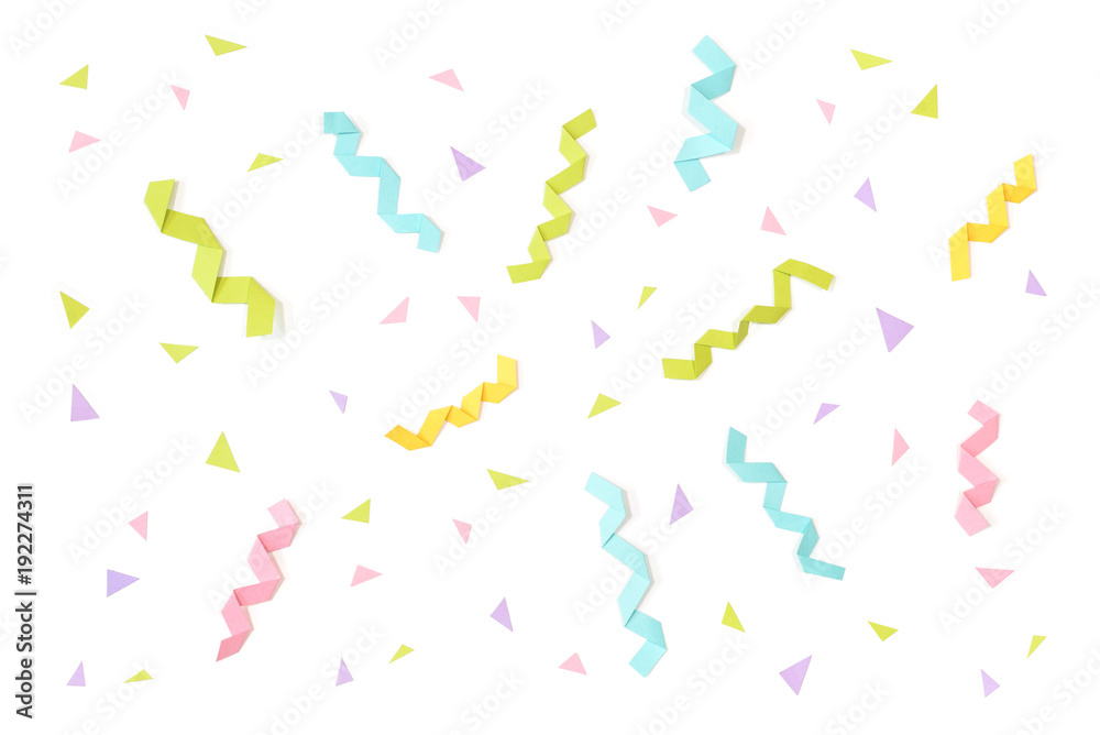 Confetti and ribbon paper cut on white background - isolated