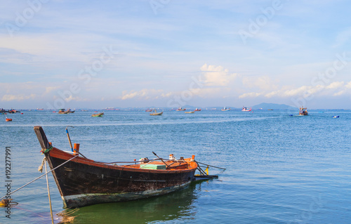 Fishing boat with seasacpe daylight background