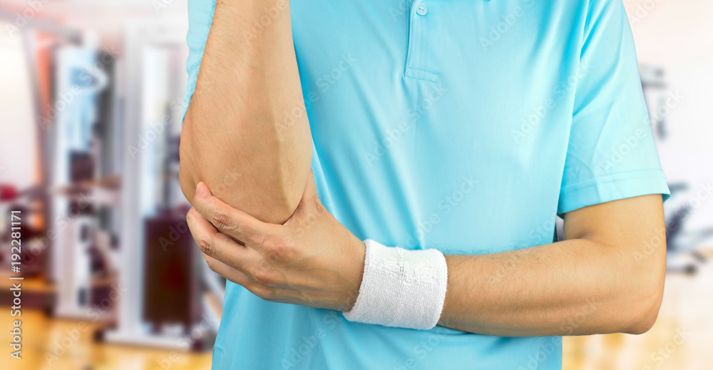 sport man with elbow injury