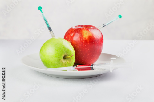 fresh juicy fruits on a plate processed with chemicals