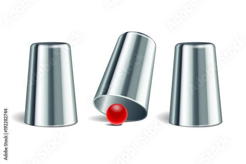 Shell game. Three thimbles and ball.