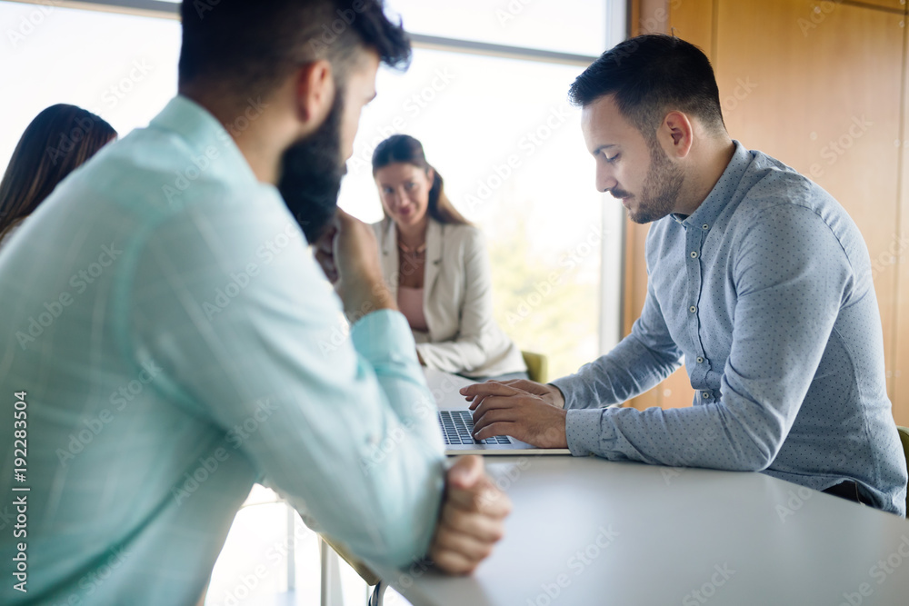 Obraz premium Picture of young architects discussing in office