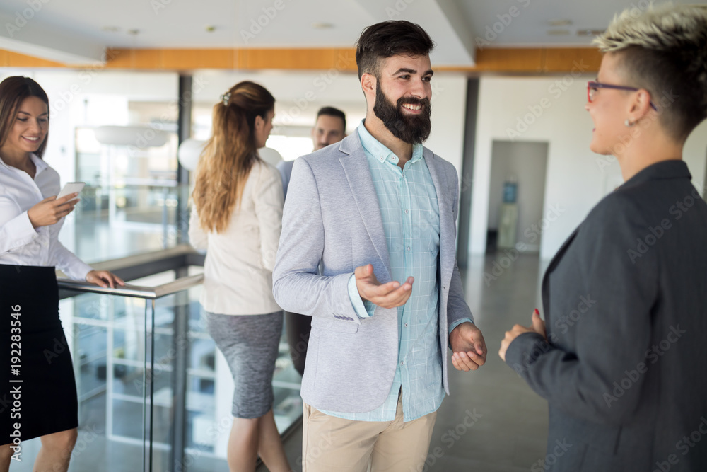 Picture of business colleagues talking in office Picture of business colleagues talking in office