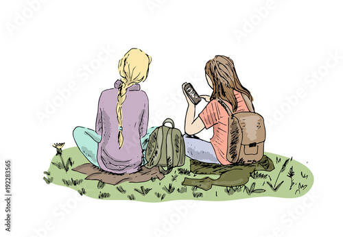 Two girls with backpacks and smartphones sitting on the grass. Sketch, hand drawn.