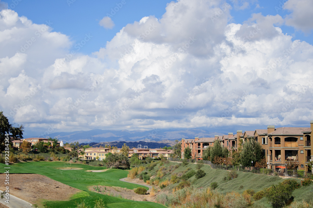 golf field with clouds in sunny day golf field with clouds in sunny day