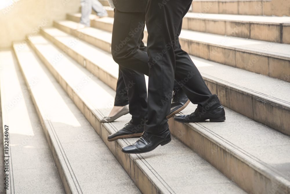 group of business person walking on stairs. rush hour concept group of business person walking on stairs. rush hour concept
