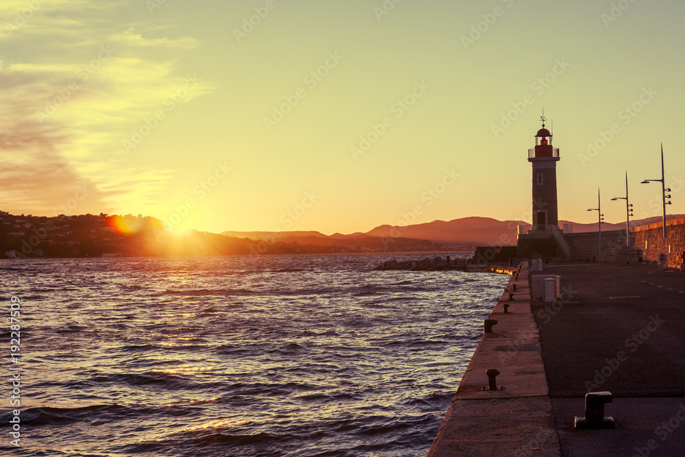Bright beautiful colorful sunset, Lighthouse in Saint Tropez, France, Cote d Azur, Provence