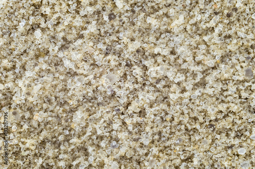 Natural river sand close-up. Large pure grains of sand.