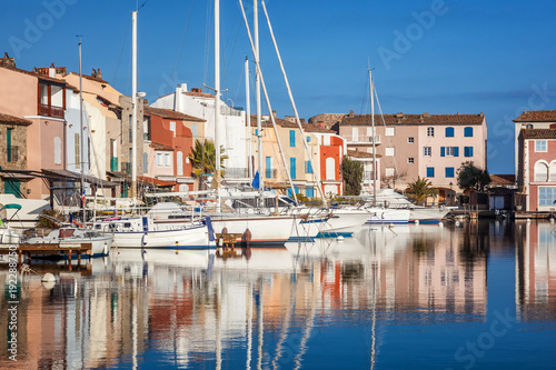 Colorful city on the water, Port of Grimaud, Côte d'Azur, France, Provence, houses and boats. Beautiful city landscape