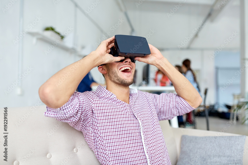 happy man with virtual reality headset at office happy man with virtual reality headset at office