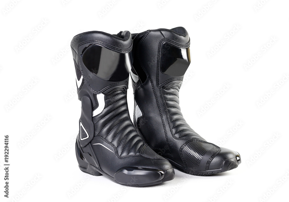 Black and white sports motorcycle boots. Isolated on a white background