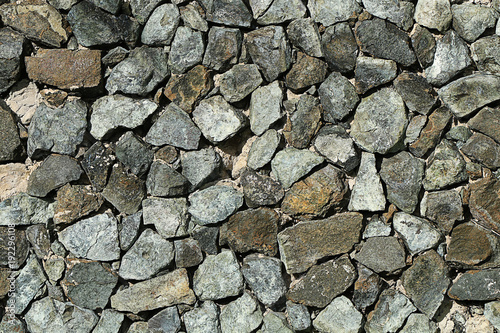 Texture of stones and cobblestones. Gray gravel