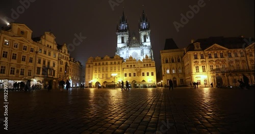 View across the Old Square towards the Church, timelapse, starom the central square of Prague, Prague Castle and Old Town, wide angle, view from the bottom point, Prague, October, 2017 photo