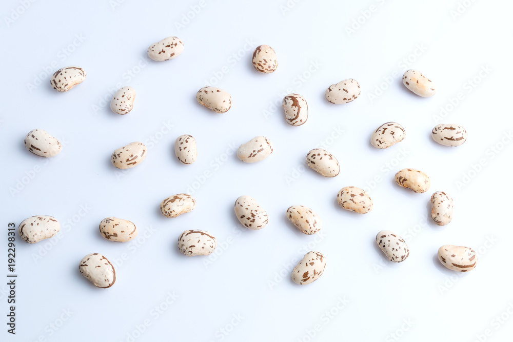 Big light brown bean grain, bean pod, a lot of beans texture pattern background for web design and sale. time to plant or cooking. on white background with space for text