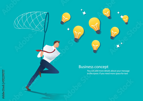 businessman holding a butterfly net try to catch light bulb. idea concept