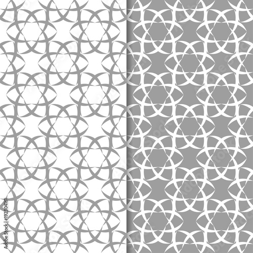 White and gray set of floral seamless patterns