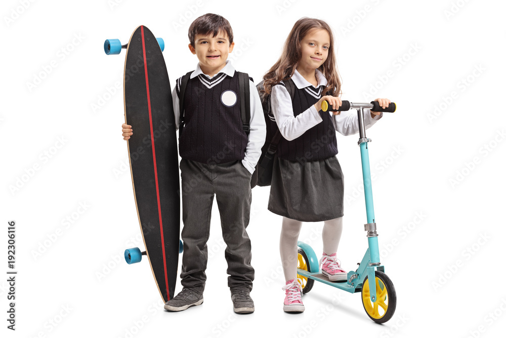 Schoolboy with a longboard and a schoolgirl with a scooter