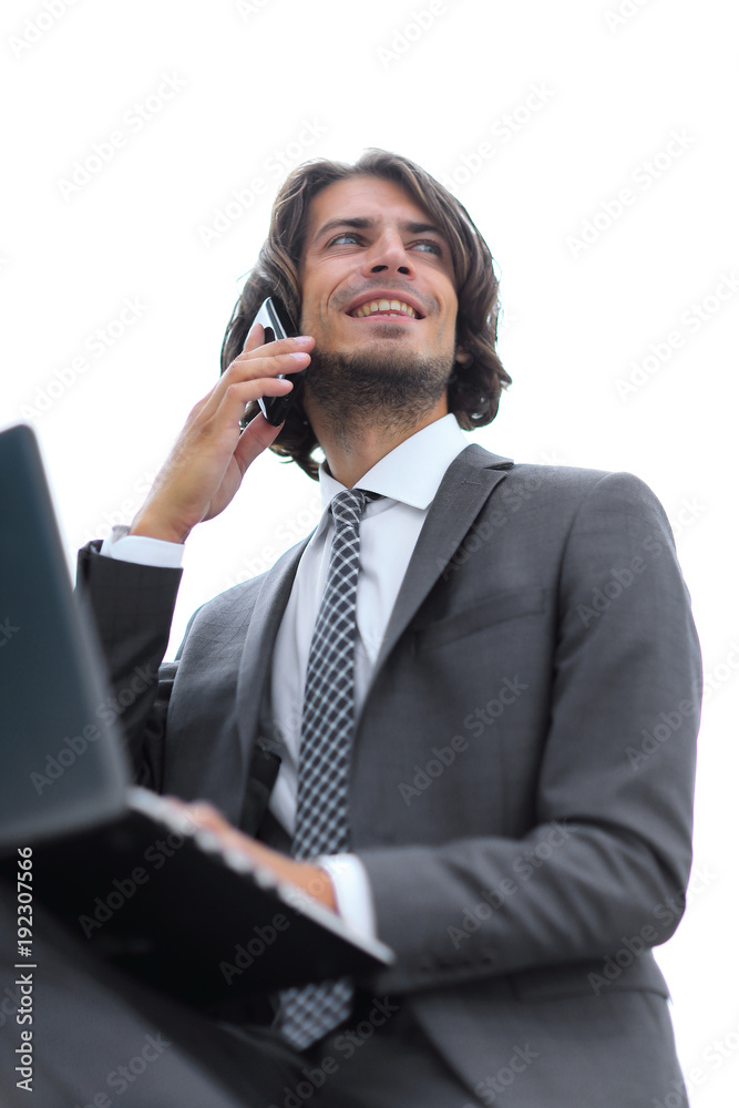 closeup.successful businessman talking on the phone closeup.successful businessman talking on the phone