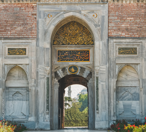 Old entrance gate to Sultanahmet park near Topkapi Palace on a sunny day at Istanbul Turkey - travel architecture background. photo