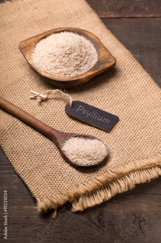 Psyllium  on rustic wooden background photo