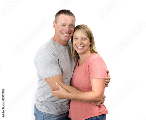 young attractive happy couple in love looking sweet and cheerful in wife and husband or girlfriend and boyfriend successful relationship concept