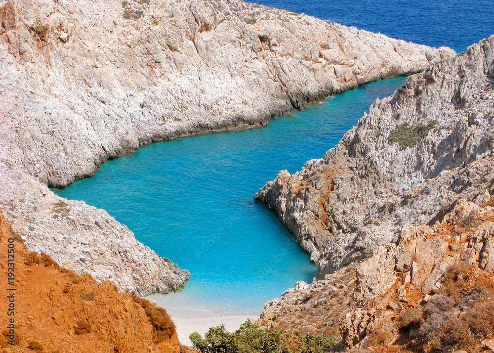 Greece, Crete. Beach of Seitan Limania in bay with turquoise water and an unusual shape. The beach is located only 22km northeast of Chania at the east side of Akrotiri Cape.