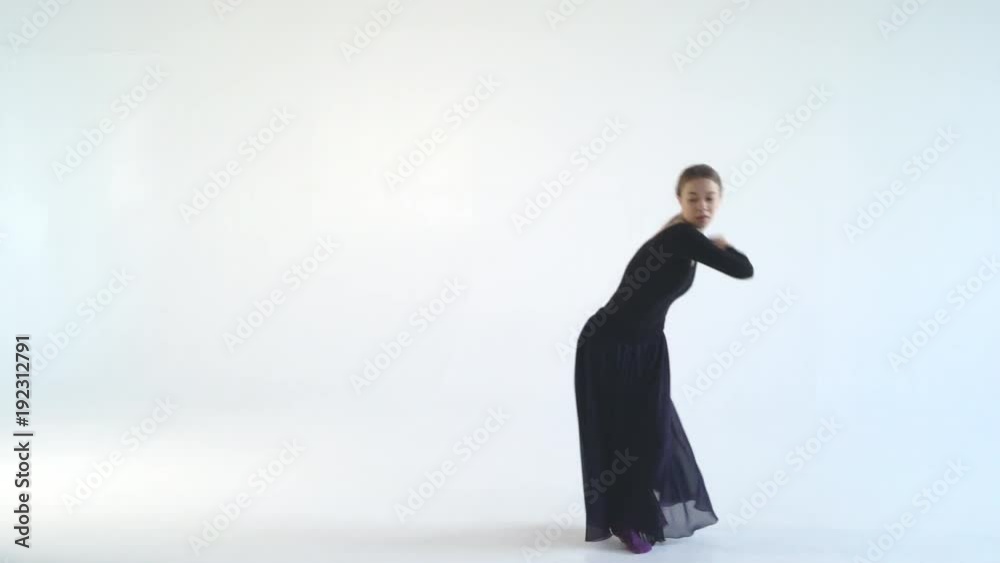 young blonde woman dancing on isolated white background. Staging emotional choreography. a lot of expression in the movements. dance on a white cube in a cycramrame 4k young blonde woman dancing on isolated white background. Staging emotional choreography. a lot of expression in the movements. dance on a white cube in a cycramrame 4k