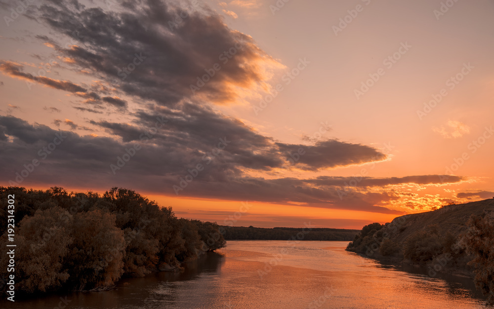 Sunset over  river