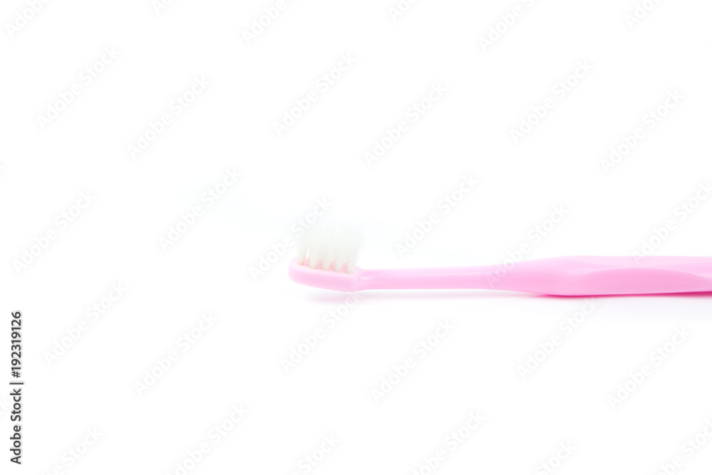 used pink tooth brush on white background used pink tooth brush on white background