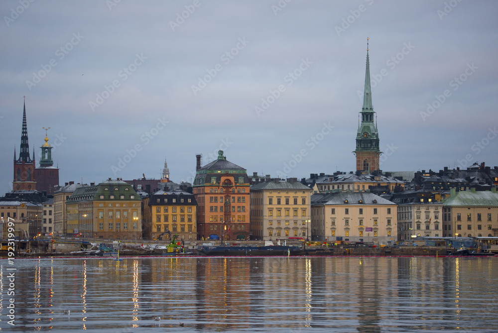 Landmarks an houses at the island Riddarholmen at the lake Malaren in Stockhlom a cold winter morning