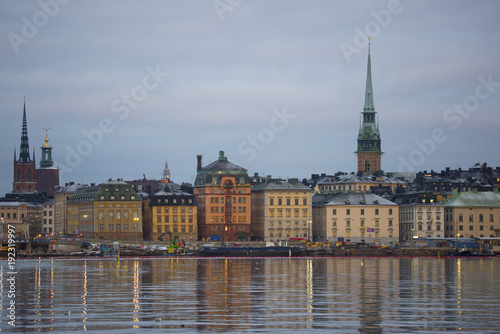 Landmarks an houses at the island Riddarholmen at the lake Malaren in Stockhlom a cold winter morning