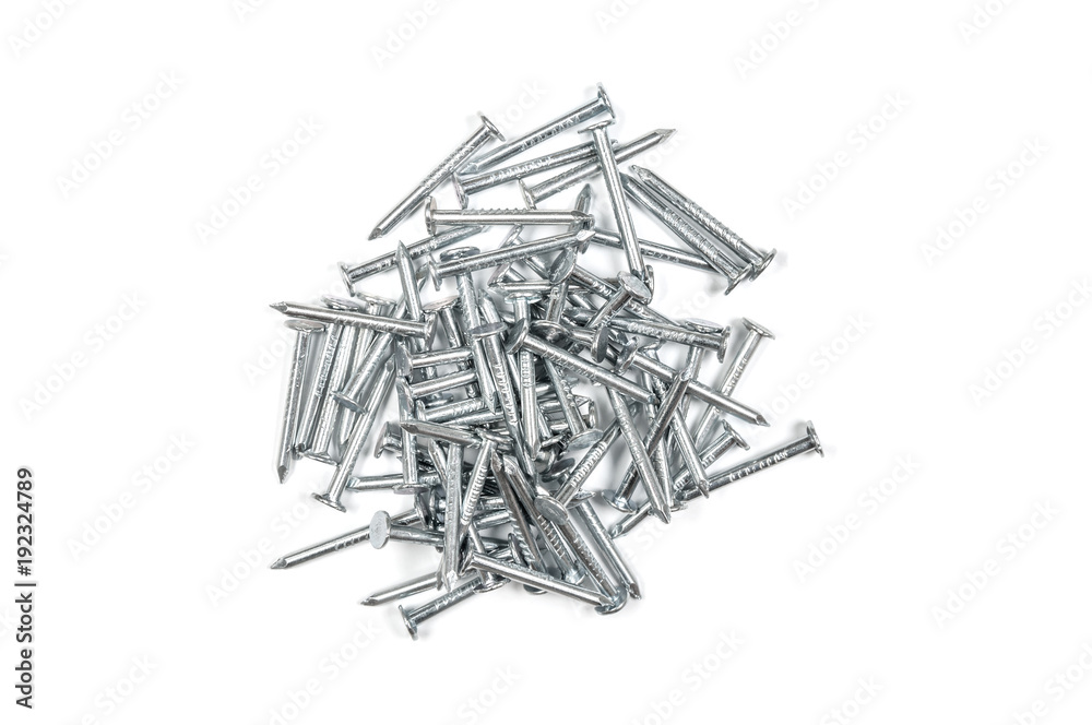 Pile of metal nails on white background