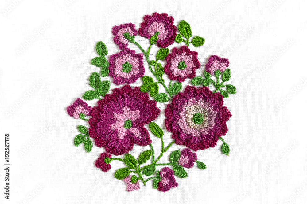 Embroidery bouquet of flowers in purple on white fabric with smooth handwork, trend 2018 Embroidery bouquet of flowers in purple on white fabric with smooth handwork, trend 2018