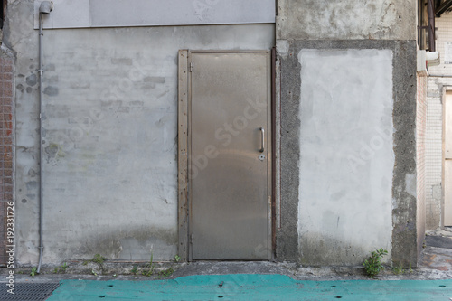 sidewalk by street wall & door © RobbinLee