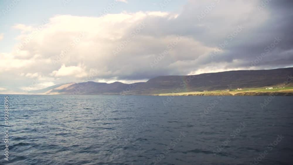 Rainbow seen From Sea while Sailing Rainbow seen From Sea while Sailing