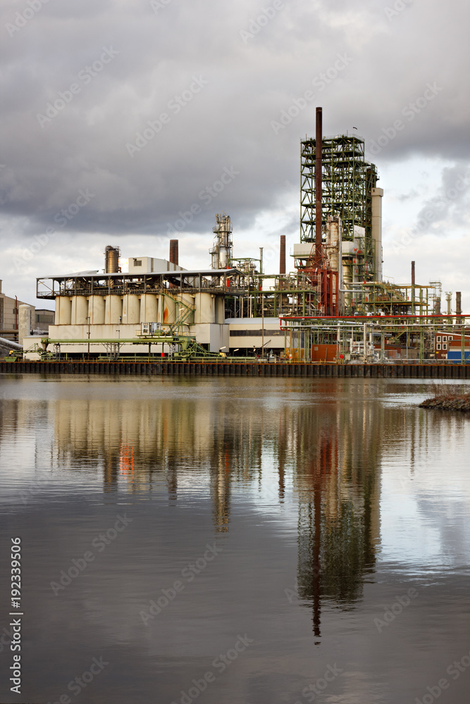 Naklejka premium Oil Refinery At Canal