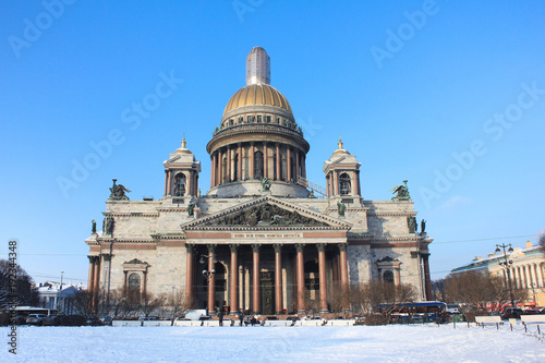 St. Petersburg Saint Isaac's Cathedral Winter View in Russia. Outdoor Vintage Postcard of Russian Old Architecture Building, Popular City Landmark Isolated on Clear Blue Sky Background and Copy Space.