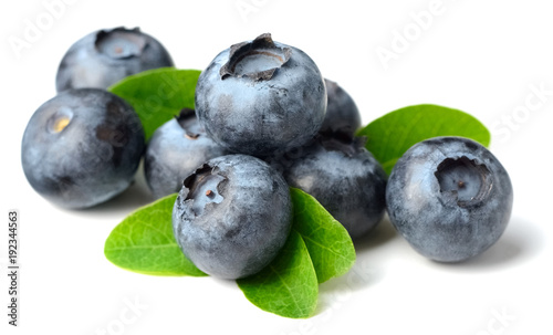 fresh blueberries with green leaves isolated on the white background