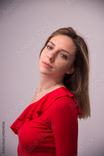 Portrait of Young Beautiful Blonde Girl in studio on white